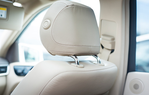 White leather car seats  detail with focus on stitch