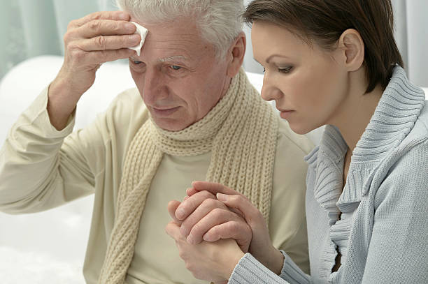 istock ill Senior man  with caring daughter 538349482