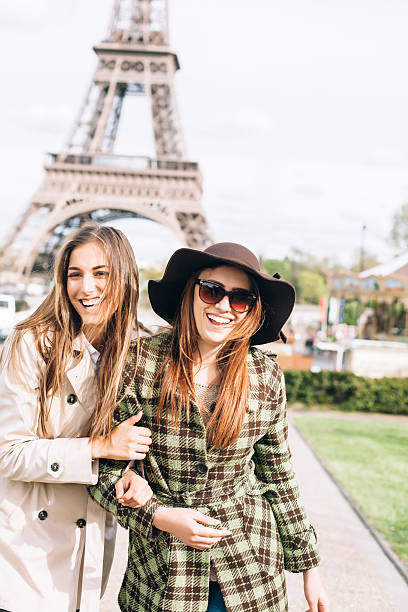 istock Laughing young women walking in front of Eiffel Tower 538351958