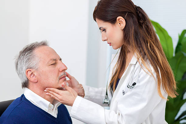 istock Doctor checking the lymph nodes size of her patient 538351998