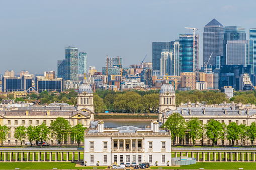 Looking across the rooftops of London towards the skyscrapers of the main financial district.