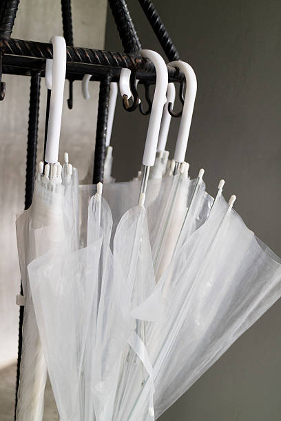 istock transparent umbrella on black metal stand 538353530