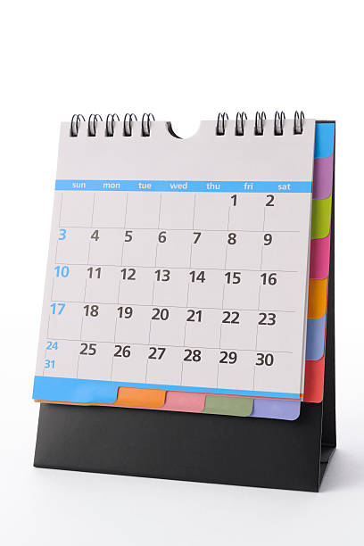 istock Isolated shot of blank multicolored desktop calendar on white background 538354009