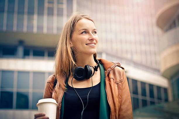 istock happy woman in a city 538355046