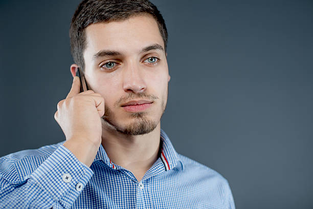 istock Businessman talking on smart phone 538357401