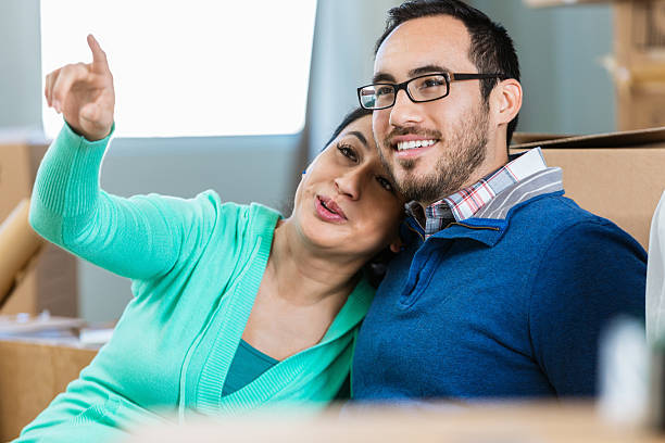 istock Couple imagines how they will decorate new home 538358190