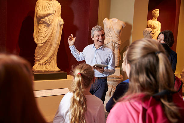 istock Pupils And Teacher On School Field Trip To Museum 538358264