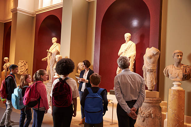 istock Pupils And Teacher On School Field Trip To Museum 538358342
