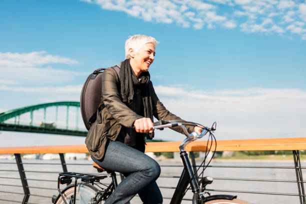 istock Mature Woman Riding  Her Bicycle. 538358862