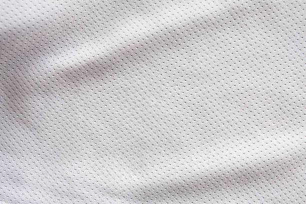 White sports clothing fabric jersey White sports clothing fabric jersey texture basketball uniform stock pictures, royalty-free photos & images