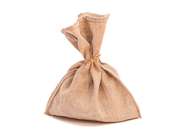 istock Tied with rope sack bag isolated on white 538359437