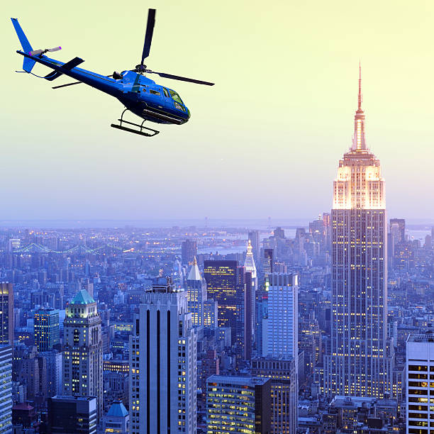 istock Helicopter flying over Empire State Building, NYC. Aerial View. 538359777