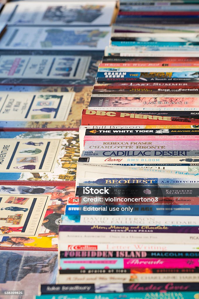 Second Hand Books London, United Kingdom - February 18, 2015: A selection of second hand books  lined up on a table at the market in central London 2015 Stock Photo