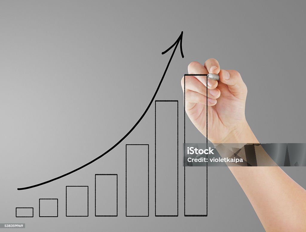Person Drawing Graph Man Drawing A Graph Stock Photo - Download Image Now - 2015, Business ...