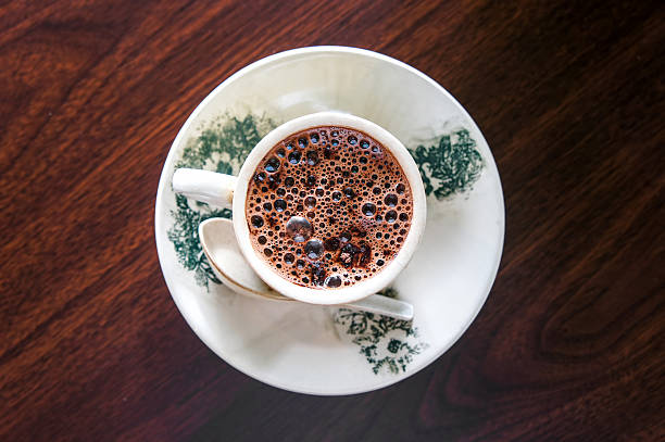 istock Cup of hot chocolate on wooden surface 538360041