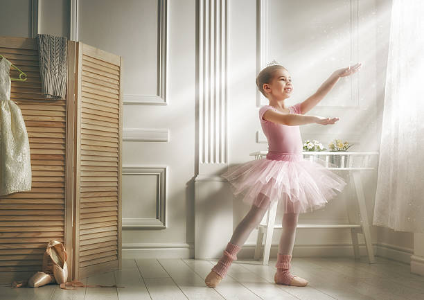 istock girl in a pink tutu 538360158
