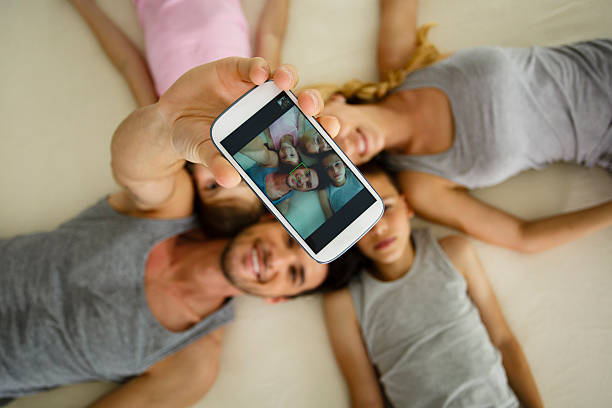 istock Family taking selfie 538362460