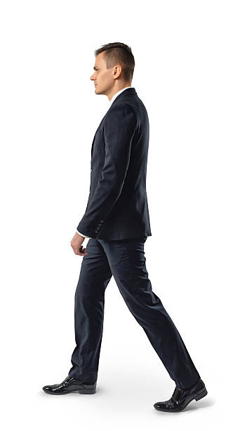 istock Side view of businessman walk, isolated on white background 538363588