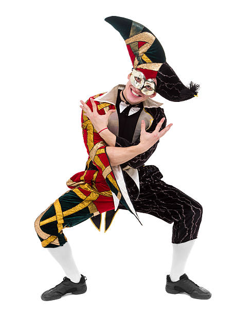 istock harlequin wearing a mask, isolated on white background in full 538365912
