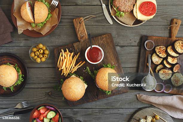 Burgers With Different Food Stock Photo - Download Image Now - Cafe, Food, Dining