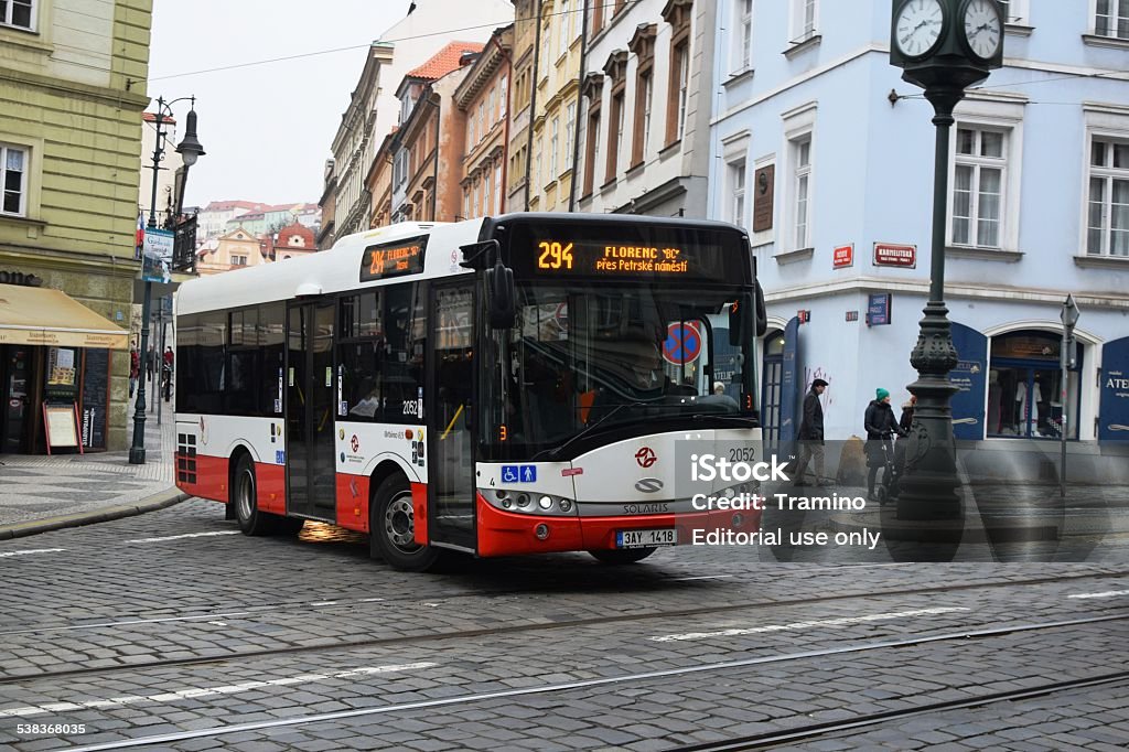 Small city bus in the centre of Prague Prague, Czech Republic, February 17th, 2015: Small city bus Solaris Urbino 8,6 goes through the city. Short and tight buses are a solution to the narrow streets in many European cities. 2015 Stock Photo