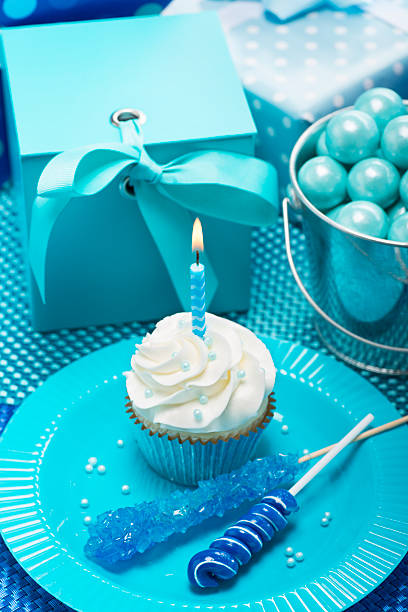 istock Birthday Boy Blue Party with Candy Presents and Cupcakes 538368441
