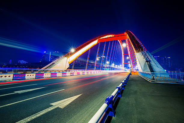 istock traffic trails at caiyuanba yangtze river bridge,chongqing 538369498