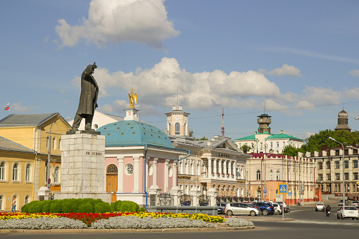 Tomsk, Russia - August 16, 2014: Lenin Statue in Tomsk, stands as a reminder of its Soviet past, a vast brooding statue of Lenin still glowers over a city centre that has already lost much of its Communist feel.