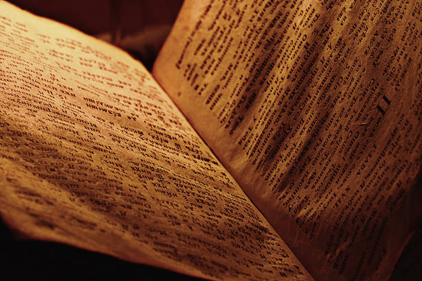 istock concept of knowledge, vintage book candle 538373087