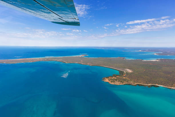 Flying over Cape Leveque Airplane flies over Cape Leveque in Western Australia. kimberley plain stock pictures, royalty-free photos & images