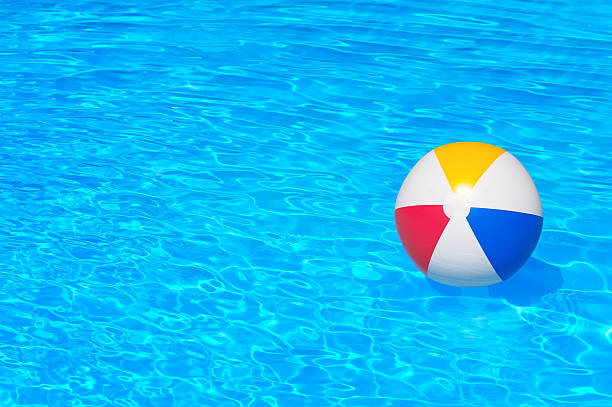 istock Inflatable ball in swimming pool 538373533