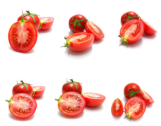 istock tomato and slices of tomato on white background 538389179