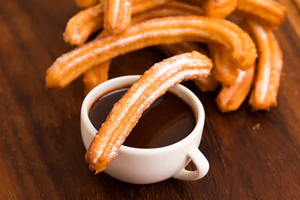 istock deliciuos spanish Churros with hot chocolate 538390085