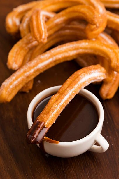 istock deliciuos spanish Churros with hot chocolate 538390757