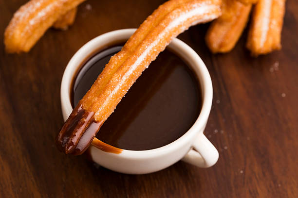 istock deliciuos spanish Churros with hot chocolate 538390763