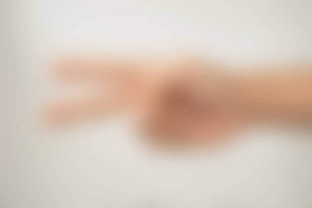 istock two fingers of the man blur 538392601