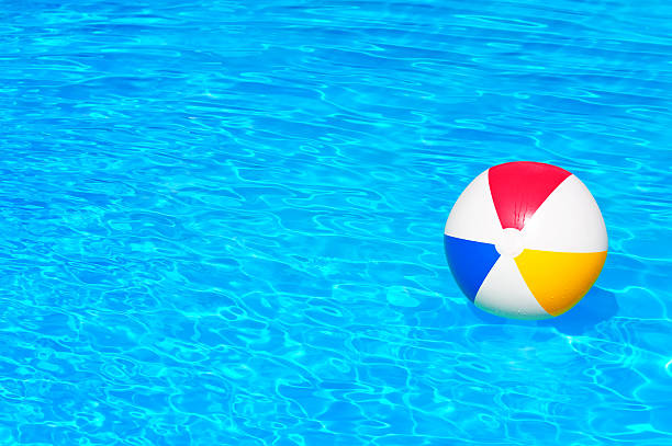 istock Inflatable ball in swimming pool 538392815