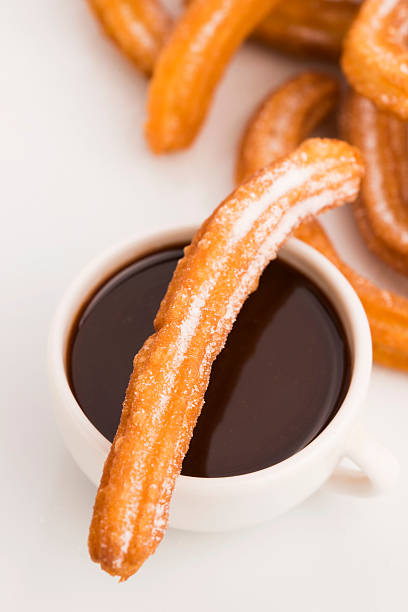 istock deliciuos spanish Churros with hot chocolate 538395141