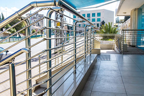 Stainless steel railings Stainless steel handrails are installed on the walls and steps. shooting guard stock pictures, royalty-free photos & images