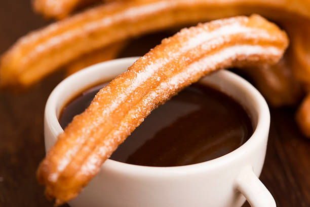 istock deliciuos spanish Churros with hot chocolate 538396309