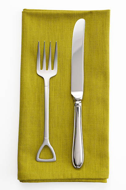 istock Isolated shot of joke silverware with napkin on white background 538396579