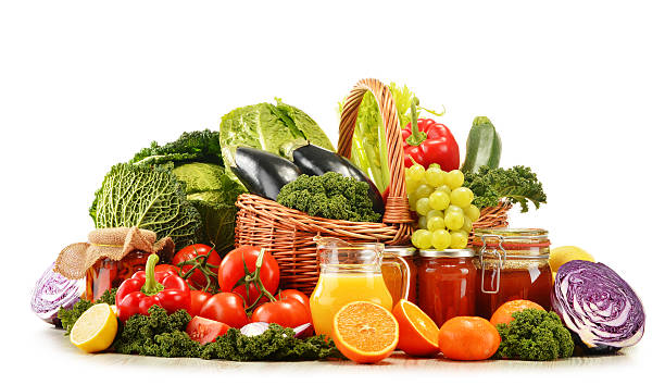 istock Wicker basket with assorted organic vegetables and fruits  isola 538407009
