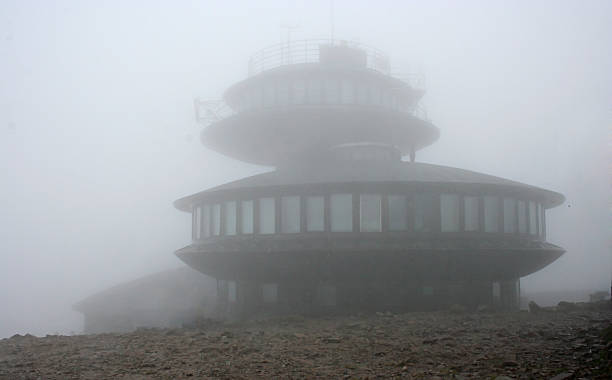 Meteo observatory on Sněžka The Polish meteo observatory on Śnieżka Heap in fog. sněžka stock pictures, royalty-free photos & images