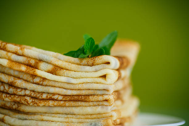 many thin pancakes on a plate