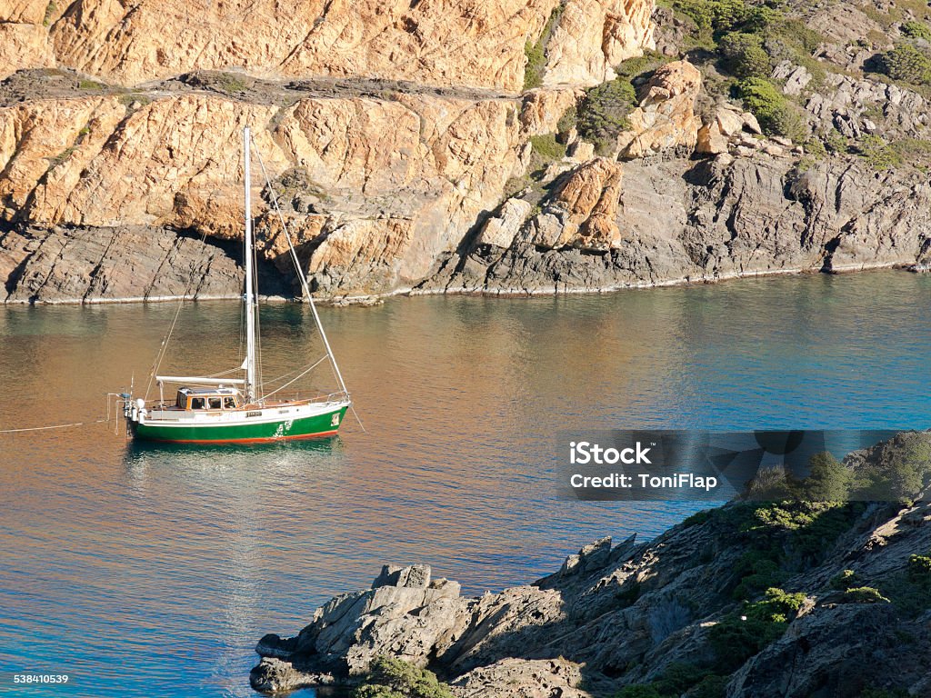 Boats on mediterranean bay. Spain Boats on mediterranean bay. The Cap de Creus, a natural park, is ideal for excursions on foot or by boat. Situated in the northern Costa Brava, Girona province, Catalonia, Spain. 2015 Stock Photo