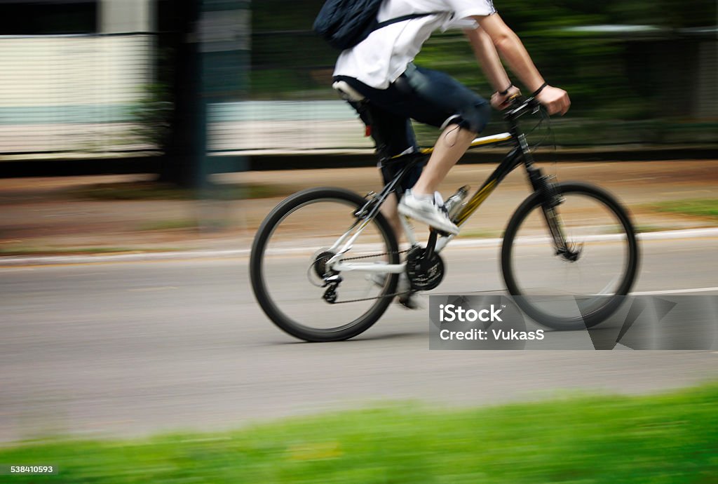 Young man speeding on a mountain bike 2015 Stock Photo