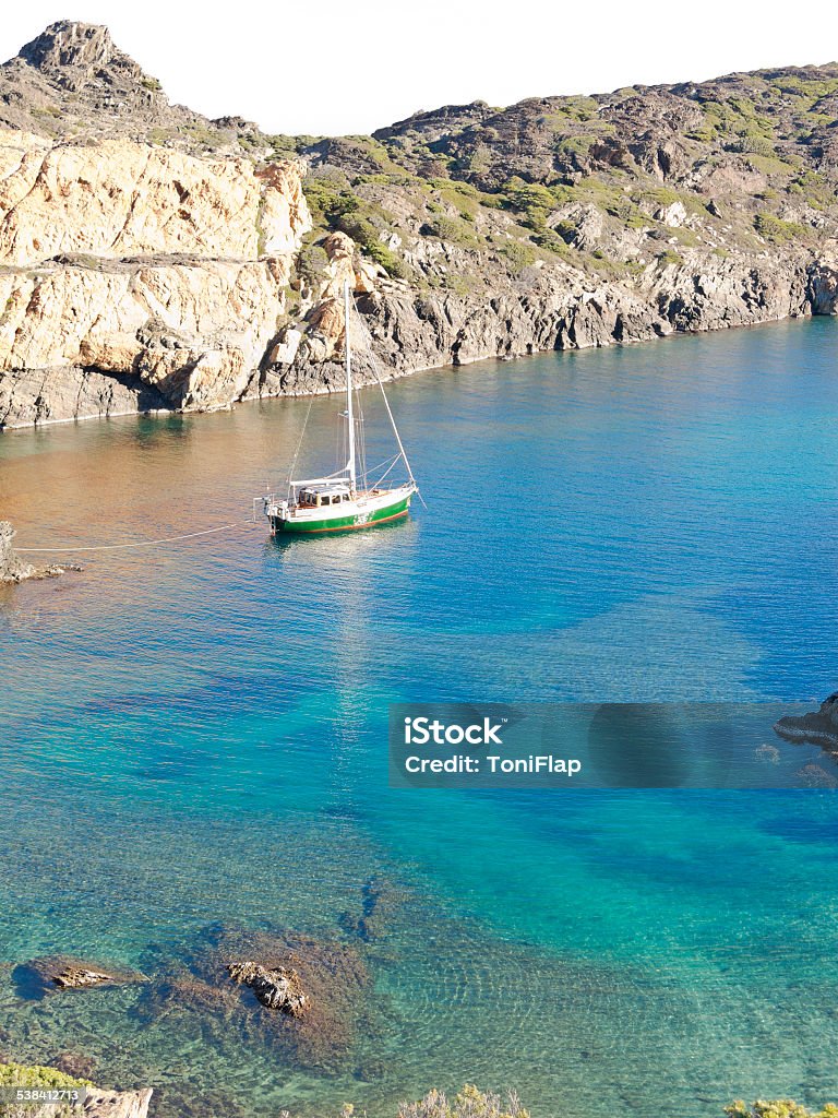 Boats on mediterranean bay. Spain Boats on mediterranean bay. The Cap de Creus, a natural park, is ideal for excursions on foot or by boat. Situated in the northern Costa Brava, Girona province, Catalonia, Spain. 2015 Stock Photo