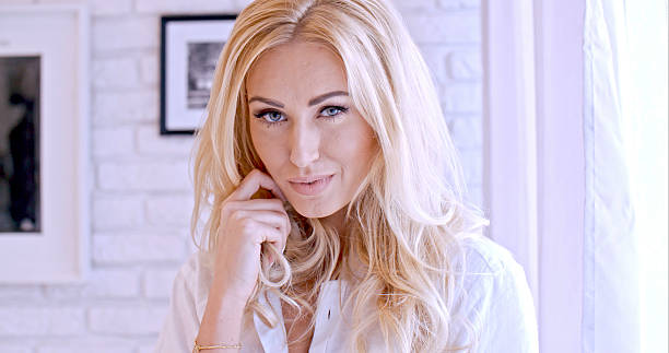 istock Blond Female Smiling at the Camera 538446227