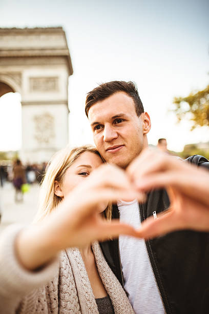 istock romantic couple enjoying the sunset on Paris 538446375