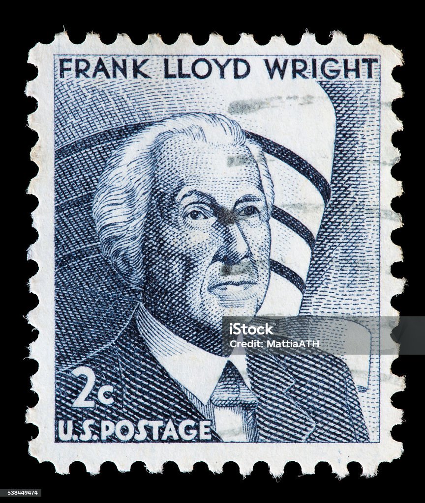 United States used postage stamp showing Frank Lloyd Wright UNITED STATES OF AMERICA - CIRCA 1966: A used postage stamp printed in United States shows a portrait of the architect and designer Frank Lloyd Wright on dark blue background, circa 1966 Frank Lloyd Wright Stock Photo